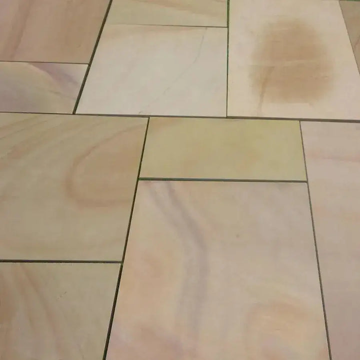 Rippon buff Indian sandstone paving slabs sawn honed